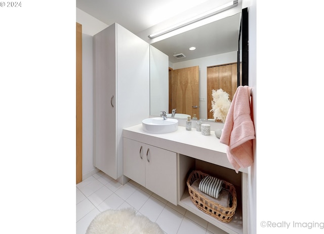 bathroom featuring tile patterned floors, visible vents, and vanity