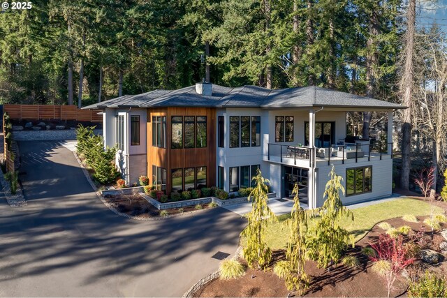 contemporary home featuring a balcony