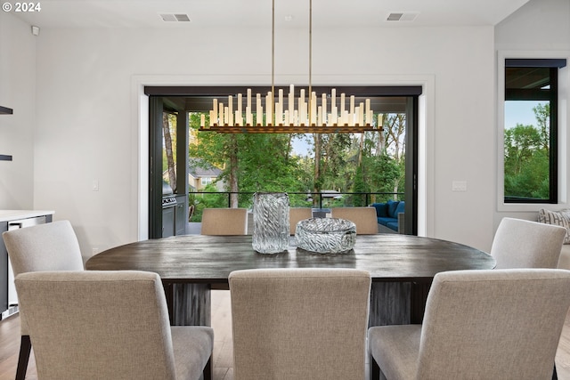 dining room featuring wood-type flooring