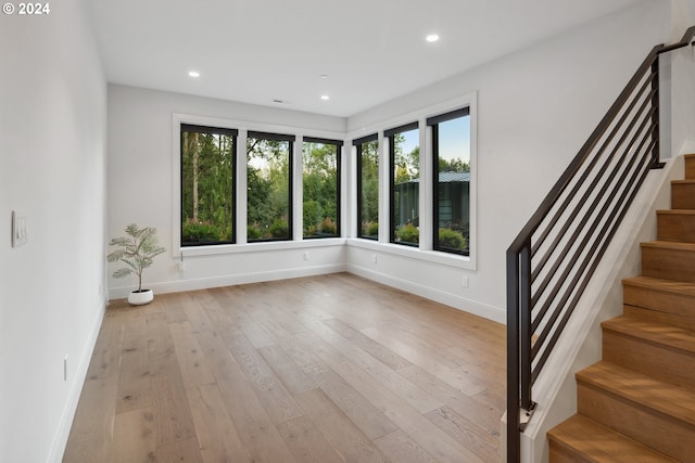 unfurnished living room with light hardwood / wood-style floors