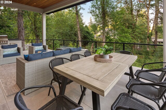 view of patio / terrace featuring outdoor lounge area and a grill