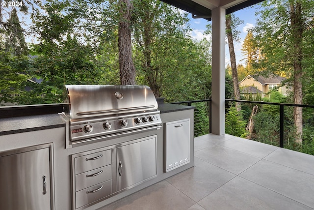 view of patio / terrace with area for grilling and exterior kitchen