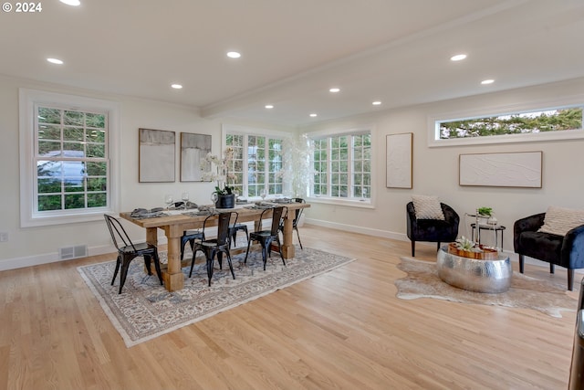 dining space featuring light wood-type flooring