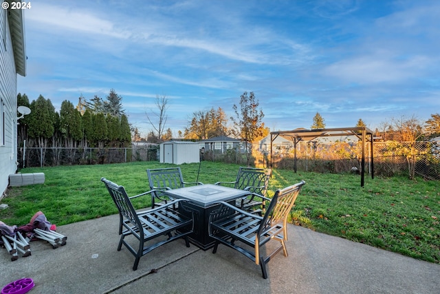 view of patio featuring a storage shed