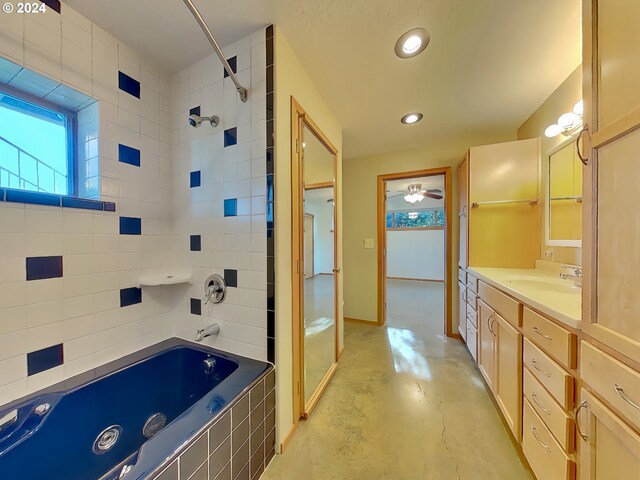 bathroom featuring vanity and concrete floors