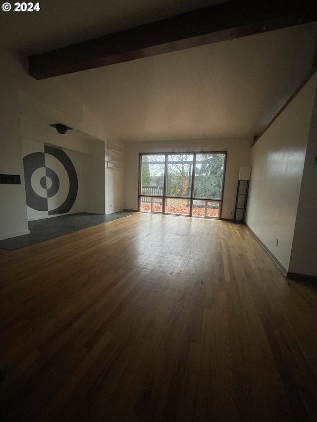 13815 NE Knott St, Portland, OR 97230 - unfurnished living room with wood finished floors and baseboards