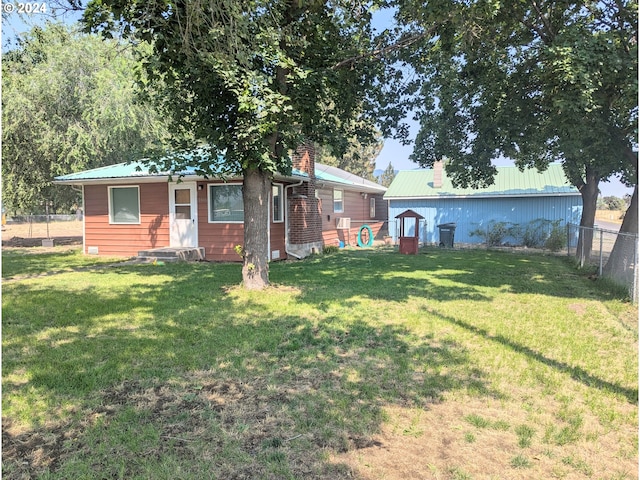 exterior space with a front lawn