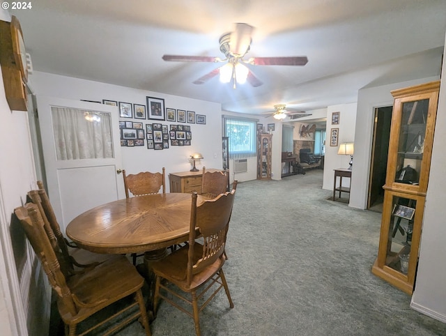 dining room with ceiling fan and carpet floors