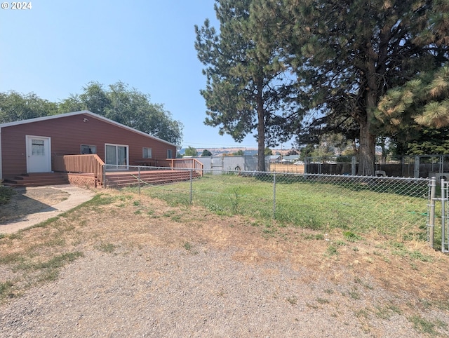 view of yard featuring a deck