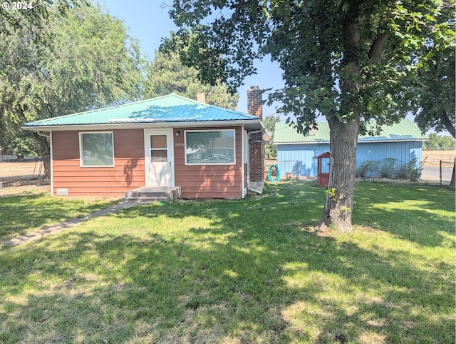 view of front of house with a front yard