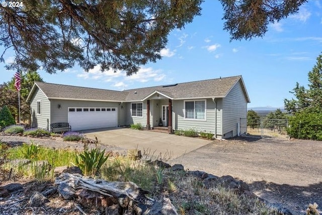 single story home featuring a garage