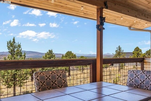 deck with a mountain view