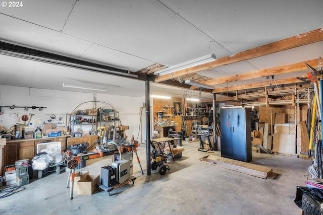 garage with a workshop area