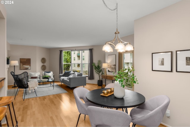 dining space featuring light hardwood / wood-style floors