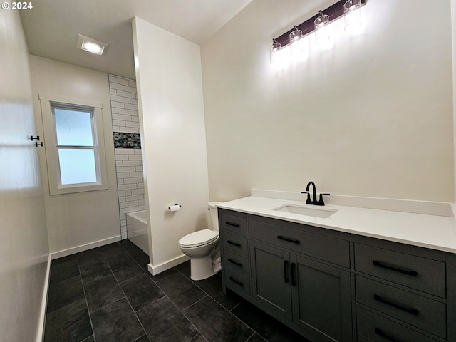 full bathroom featuring vanity, toilet, tile patterned flooring, and tiled shower / bath