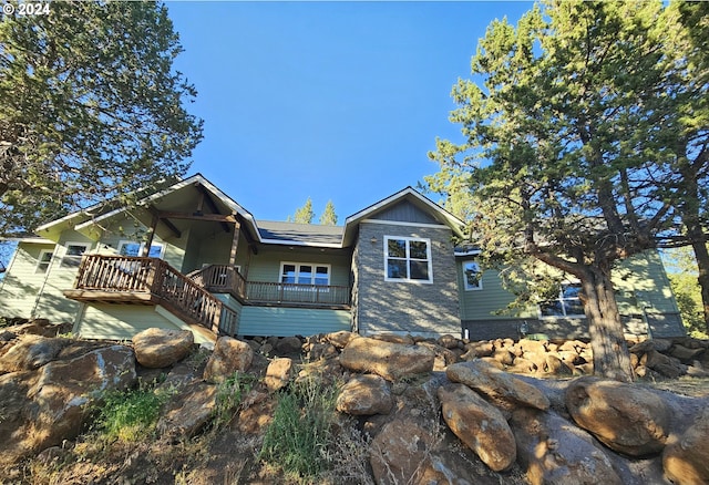 view of front of house with a wooden deck