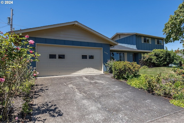 view of front of home with a garage