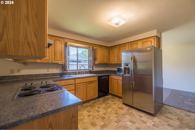 kitchen featuring stainless steel appliances and sink