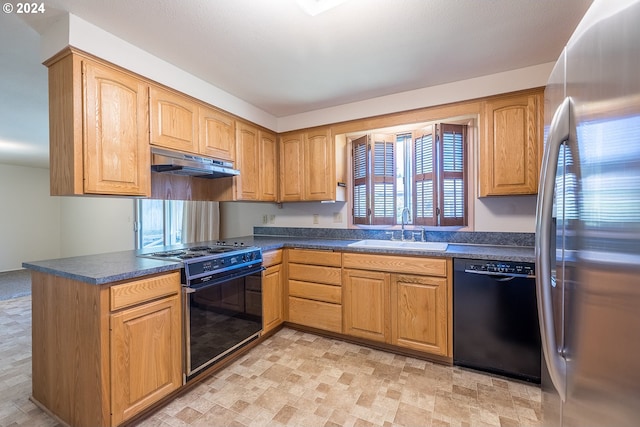 kitchen with exhaust hood, sink, and black appliances