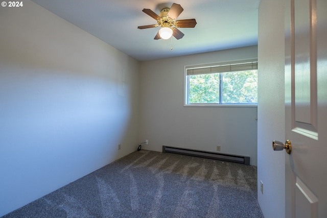 empty room with carpet flooring, ceiling fan, and baseboard heating