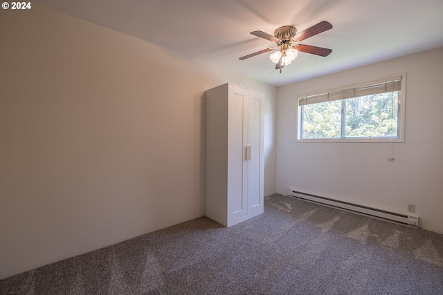 unfurnished bedroom featuring baseboard heating, ceiling fan, and carpet floors