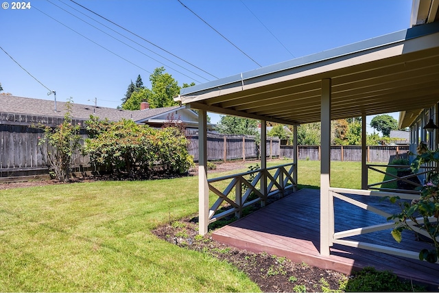 view of yard featuring a wooden deck