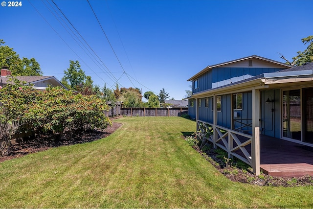 view of yard featuring a deck