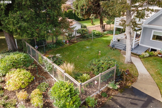 view of yard with a deck