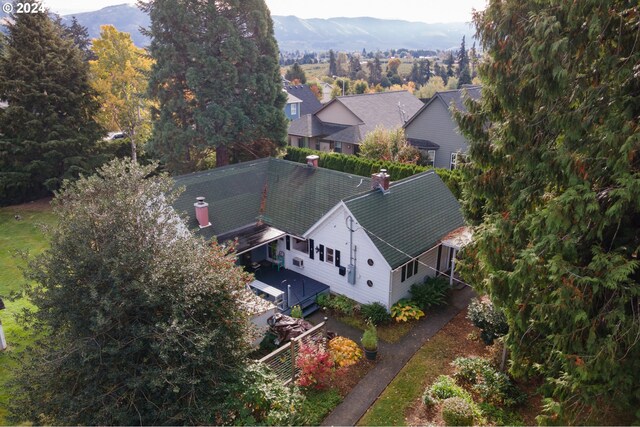 drone / aerial view featuring a mountain view