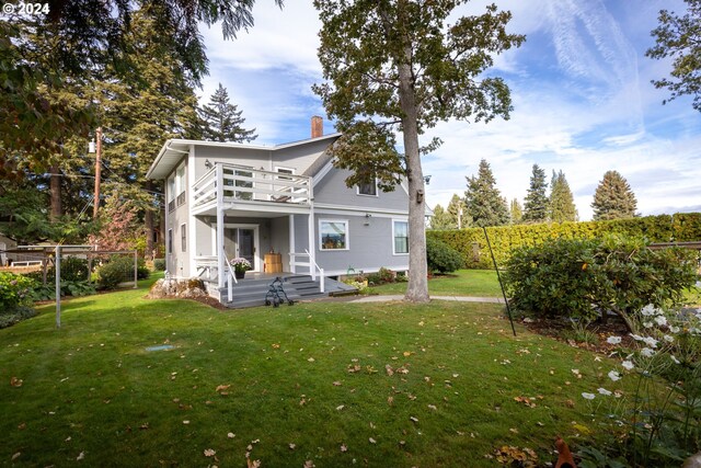 3465 Avalon Dr, Hood River, OR 97031 - back of property featuring a lawn, a chimney, and a balcony