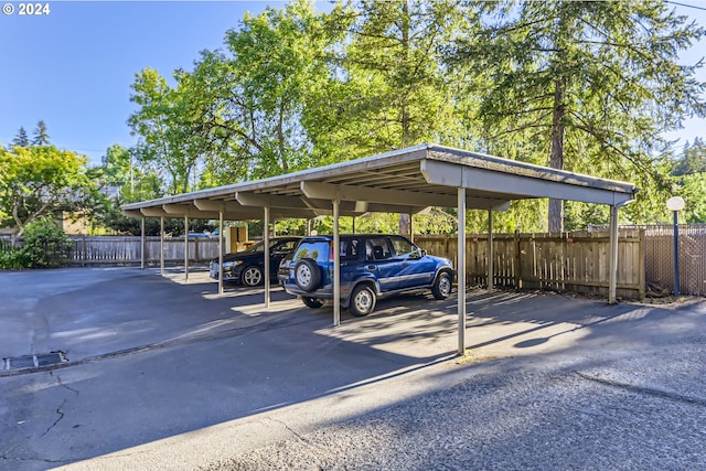 view of car parking featuring a carport