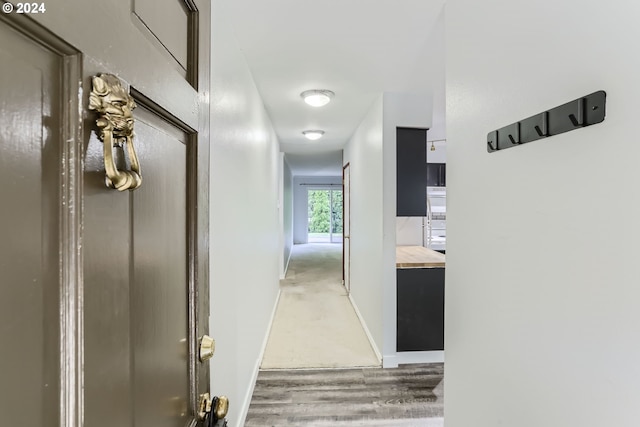 hall featuring hardwood / wood-style floors