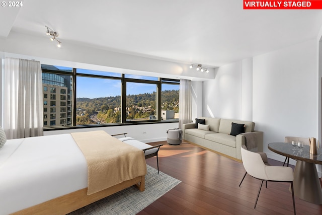 bedroom featuring hardwood / wood-style floors