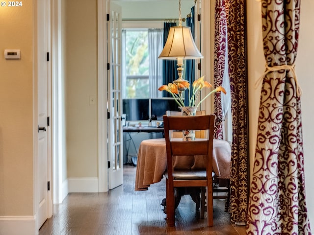 sitting room with hardwood / wood-style flooring