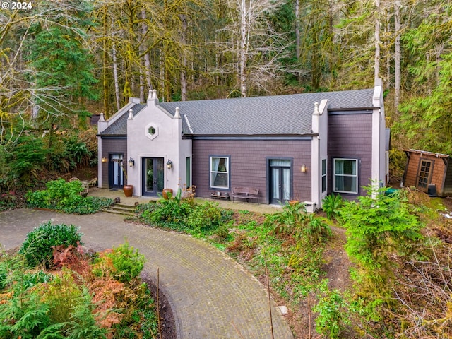 71465 Northshore Dr, Birkenfeld, OR 97016 - view of front of house featuring a chimney and roof with shingles