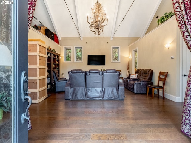 living room with lofted ceiling with beams, dark wood-type flooring, and a notable chandelier