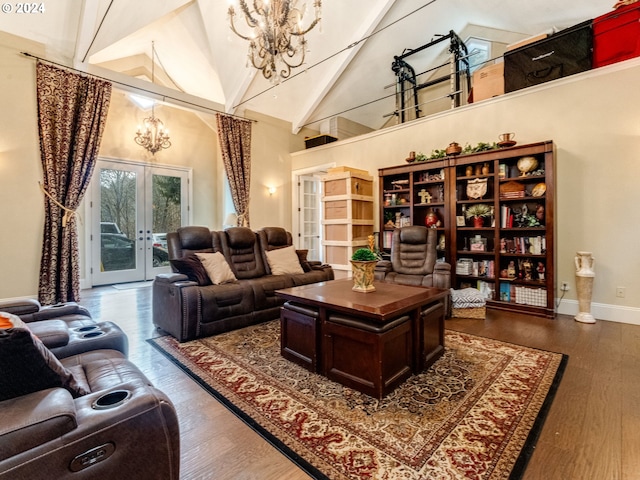 71465 Northshore Dr, Birkenfeld, OR 97016 - living room with a chandelier, french doors, high vaulted ceiling, and wood finished floors