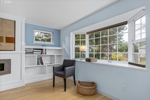 340 SW S Point St, Depoe Bay, OR 97341 - living area with wood finished floors and a fireplace