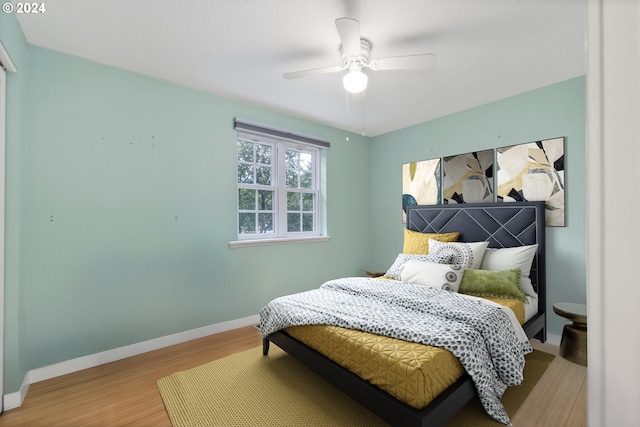 340 SW S Point St, Depoe Bay, OR 97341 - bedroom with wood finished floors and a ceiling fan