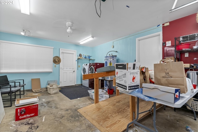 340 SW S Point St, Depoe Bay, OR 97341 - garage with independent washer and dryer, strapped water heater, ceiling fan, and water heater
