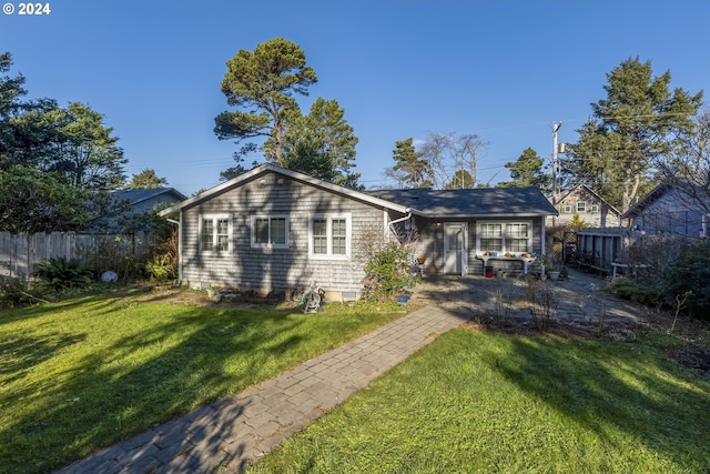 340 SW S Point St, Depoe Bay, OR 97341 - back of house with a patio area