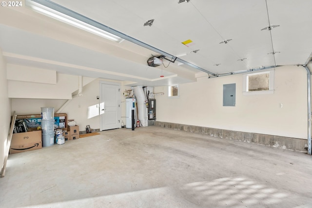 garage featuring electric panel, a garage door opener, water heater, and electric water heater