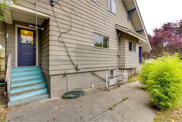 view of side of property featuring a patio