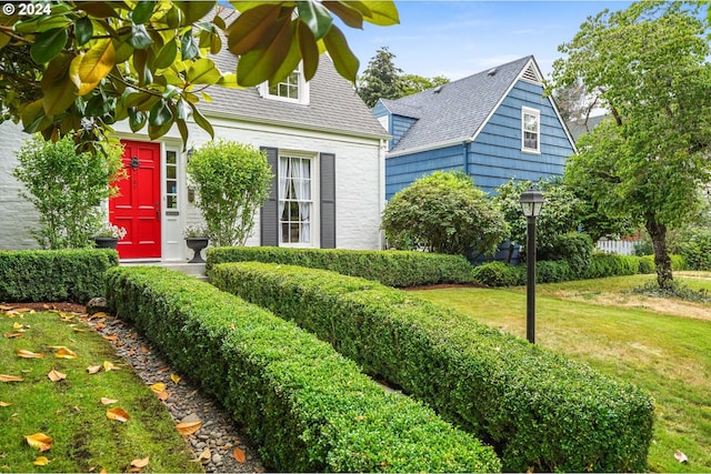 exterior space with a lawn