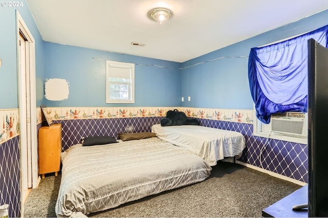 carpeted bedroom featuring cooling unit