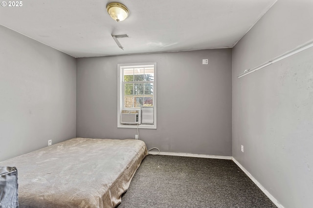bedroom featuring baseboards, visible vents, carpet flooring, and cooling unit