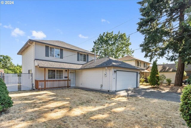 front of property with a garage