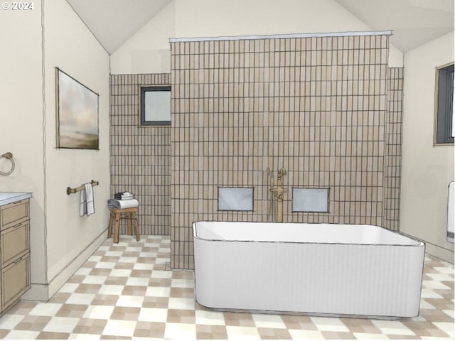 bathroom featuring vanity, a tub, tile walls, and lofted ceiling