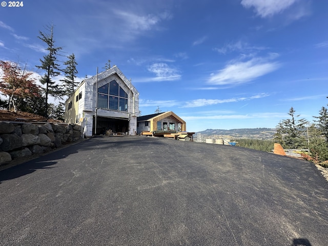 exterior space featuring a mountain view