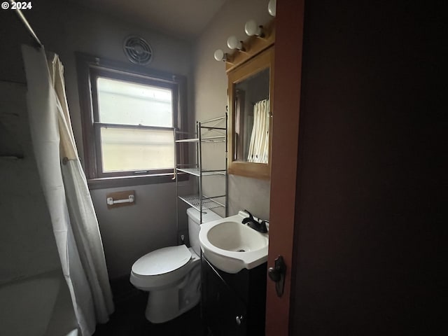 bathroom with vanity and toilet